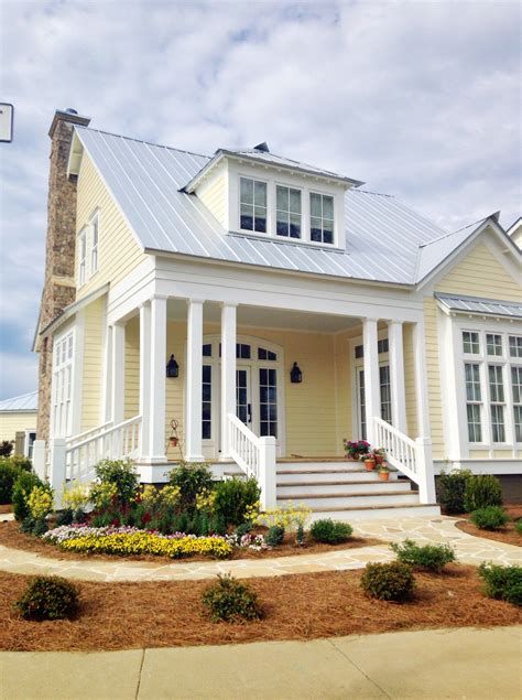 white metal roof yellow house|residential white metal roof.